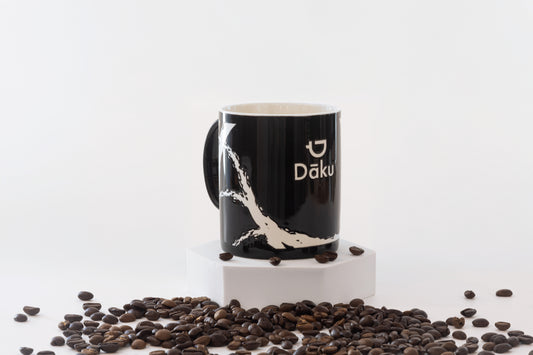 Dāku ceramic coffee mug, black with white logo
